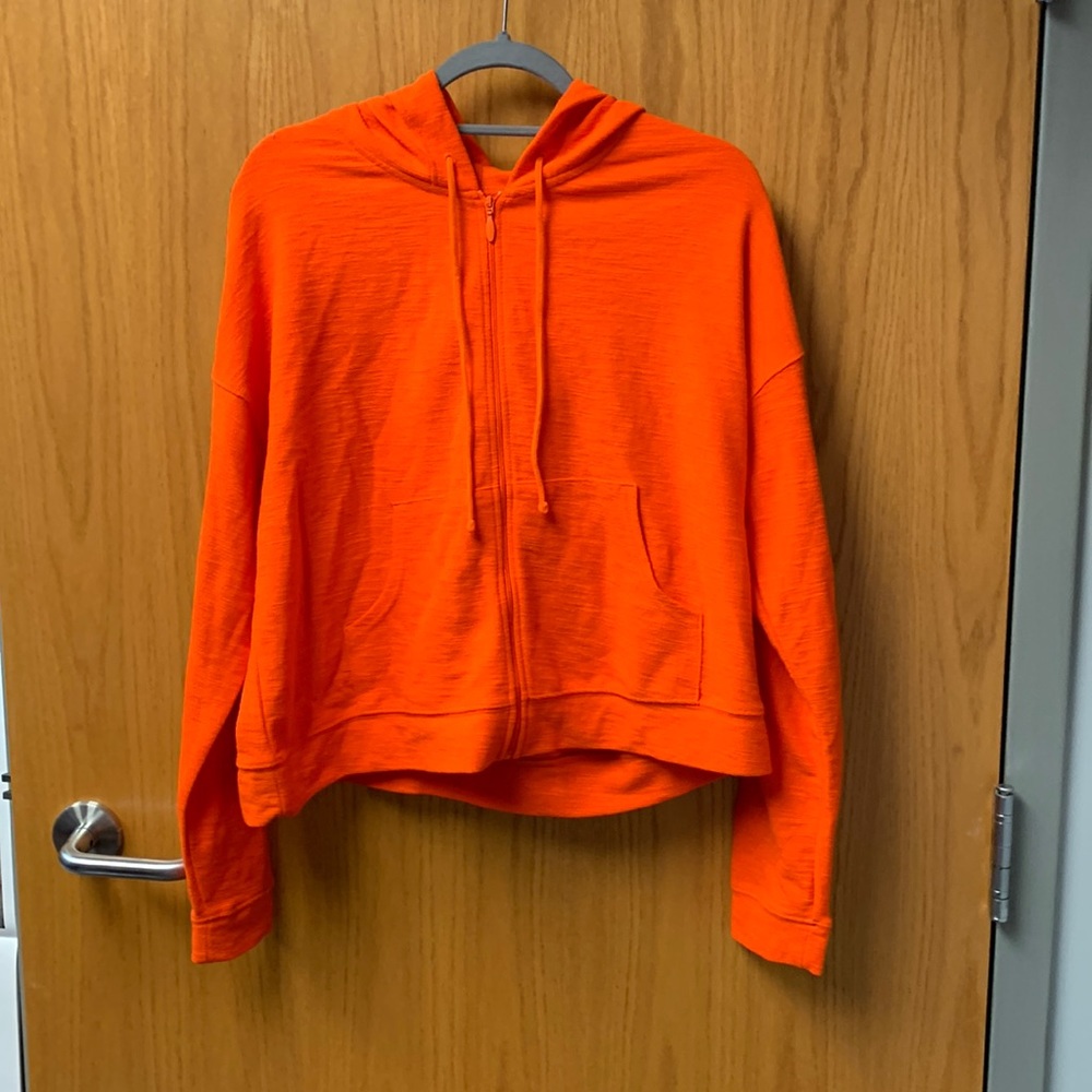 NWOT Bright orange zipped hoodie